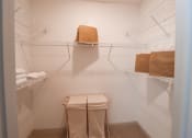 Thumbnail 8 of 54 - a walk in closet with bags and shelves in a white room at The Crest at Acworth, Georgia, 30102