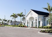 Thumbnail 17 of 33 - a building with a parking lot in front of it at The Crest at Naples, Florida