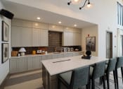Thumbnail 38 of 54 - a large white kitchen with a large island at The Crest at Acworth, Acworth, GA