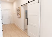 Thumbnail 5 of 53 - Wall painting and sliding door at District on the Etowah Apartments, Canton