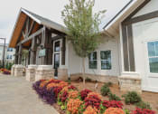 Thumbnail 30 of 54 - The Crest at Acworth Exterior of Community Clubhouse with Landscaping at The Crest at Acworth, Acworth, GA, 30102