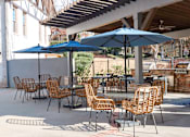 Thumbnail 28 of 40 - The Crest at Berkeley Lake grilling stations on the pool deck located in Duluth, GA 30096