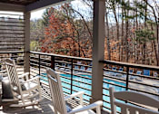 Thumbnail 33 of 40 - The Crest at Berkeley Lake view of pool from clubhouse backdeck located in Duluth, GA
