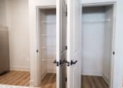 Thumbnail 6 of 60 - the closet in the master bedroom is empty and ready to be remodeled at The Crest at South Point Apartments, Georgia