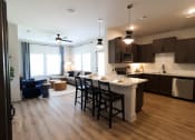 Thumbnail 3 of 60 - Kitchen and dining at The Crest at South Point Apartments, Georgia, 30253