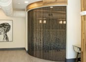Thumbnail 43 of 66 - A room with a wooden wall and a brown partition.at Riverside Apartments, Chattanooga, 37406