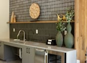 Thumbnail 40 of 66 - A kitchen with a sink and a brick wall.at Riverside Apartments, Chattanooga, 37406