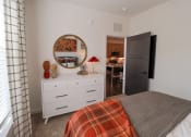 Thumbnail 7 of 46 - The Wren 1 bedroom model apartment home bedroom with oversized window located in Lawrenceville,GA