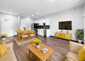 Thumbnail 8 of 11 - A modern living room with a wooden floor and furniture.