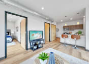 Thumbnail 8 of 18 - a living room with a tv and a kitchen with a bar