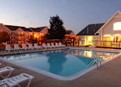 Thumbnail 1 of 16 - Pool at Night