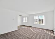 Thumbnail 2 of 20 - Spacious apartment living room at Huntington Club Apartments in Warren, Michigan