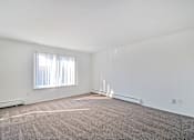 Thumbnail 8 of 20 - Spacious apartment living room at Huntington Club Apartments in Warren, Michigan