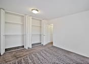 Thumbnail 10 of 20 - Spacious apartment bedroom with large closets at Huntington Club Apartments in Warren, Michigan