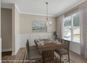 Thumbnail 12 of 51 - an image of a dining room with a table and chairs