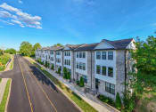 Thumbnail 17 of 23 - an aerial view of a building on the side of a street
