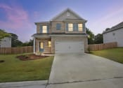 Thumbnail 3 of 51 - Night time exterior shot of Gentry Floor plan