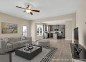Thumbnail 9 of 51 - a living room with a couch and a table