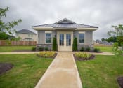 Thumbnail 39 of 51 - Front exterior shot of clubhouse