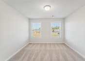 Thumbnail 31 of 50 - secondary bedroom with carpet
