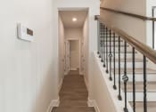 Thumbnail 29 of 50 - entry hallway that leads to 1/2 bathroom, coat closet and garage