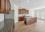 Thumbnail 24 of 50 - Kitchen with island and espresso colored cabinets