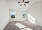 Thumbnail 23 of 50 - Primary bedroom with carpet