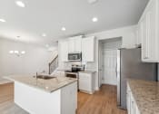 Thumbnail 38 of 50 - kitchen view with island, white cabinet color