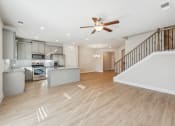 Thumbnail 15 of 50 - Kitchen view, with grey cabinets,  looking at stair way