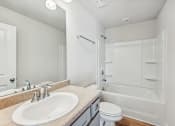 Thumbnail 19 of 50 - Secondary Bathroom with Tub Shower