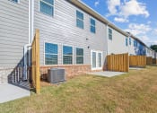 Thumbnail 37 of 50 - backyard area of townhomes.