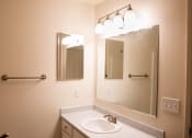 Thumbnail 14 of 16 - Bathroom With Vanity Lights at Wingsong Manor Apartments, Portland, 97215