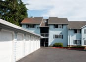 Thumbnail 6 of 16 - Garage parking at Wingsong Manor Apartments, Oregon