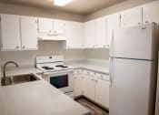 Thumbnail 8 of 16 - Fully Equipped Kitchen at Wingsong Manor Apartments, Portland