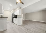Thumbnail 13 of 15 - the spacious kitchen and dining room in a 555 waverly unit