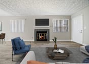 Thumbnail 11 of 21 - A living room with a fireplace and a television.