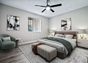 Thumbnail 4 of 15 - a bedroom with a large bed and a ceiling fan