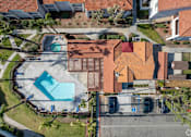 Thumbnail 1 of 14 - arial view of a house with a swimming pool in the yard
