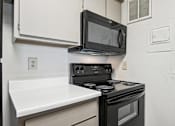 Thumbnail 90 of 110 - Updated Kitchen With Black Appliances at Abbey Glenn Apartments, Texas, 76706