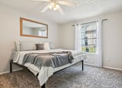 Thumbnail 49 of 110 - Bedroom With Ceiling Fan at Abbey Glenn Apartments, Waco, TX, 76706