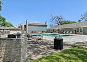 Thumbnail 27 of 110 - Poolside Relaxing Area at Abbey Glenn Apartments, Texas, 76706
