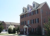 Thumbnail 2 of 6 - 3 story brick building with front stoop  at Rosewood Village, Hagerstown, Maryland