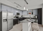 Thumbnail 25 of 28 - Model Kitchen at Moda North Bay Village, Florida