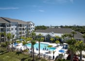 Thumbnail 14 of 29 - an aerial view of the resort with a swimming pool and palm trees
