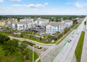 Thumbnail 28 of 29 - an aerial view of a city street with apartment buildings