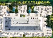 Thumbnail 5 of 28 - a birds eye view of the roof of a building with palm trees
