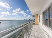 Thumbnail 7 of 28 - the view from the balcony of a condo overlooking the water