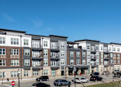 Thumbnail 31 of 31 - an exterior view of an apartment building on a city street