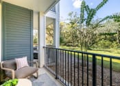 Thumbnail 19 of 20 - Image of a patio with furniture