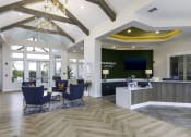 Thumbnail 14 of 29 - a lobby with a reception desk and chairs